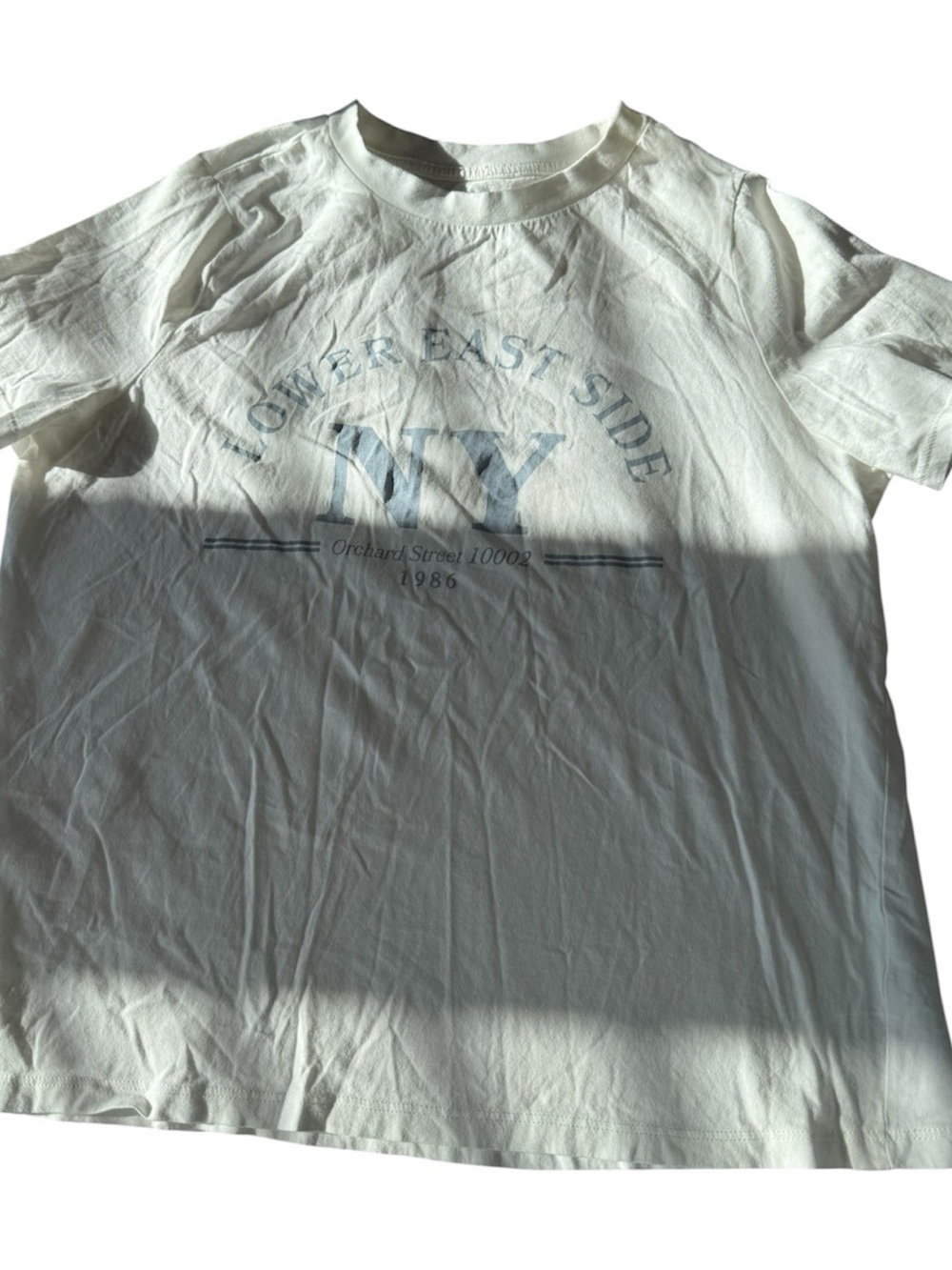 Primark White Short Sleeve Tee with Light Blue NY Graphic